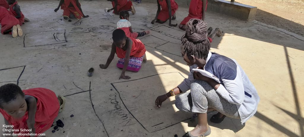 learning with charcoal at olng'arua school kenya