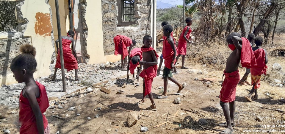 Kids clearing up their damaged school